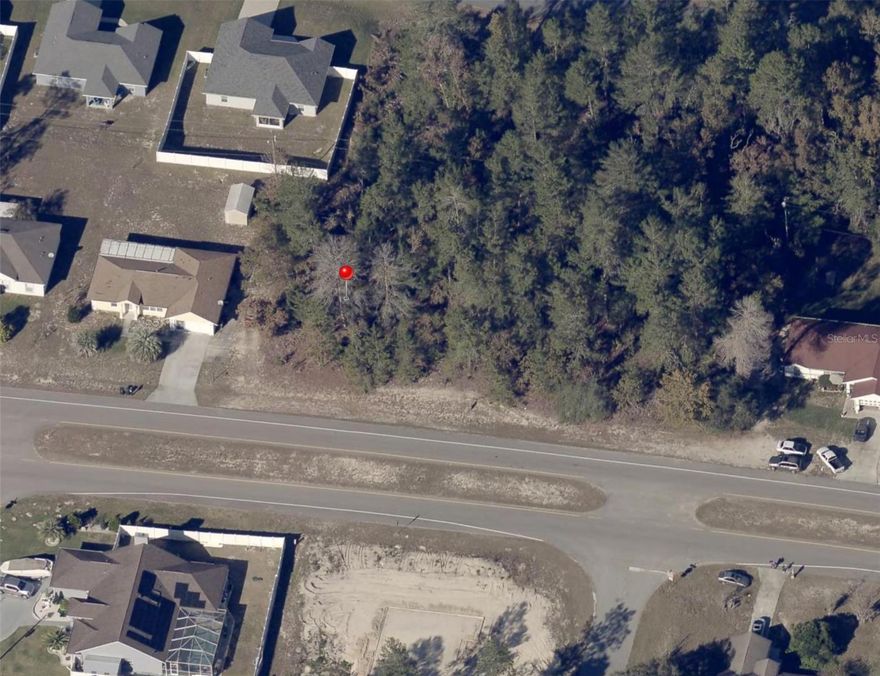 Located in the desirable community of Marion Oaks in Ocala, this 0.23-acre residential lot that offers an excellent opportunity to build your future home in a well-established and growing neighborhood. Surrounded by existing homes and paved roads, the area continues to see steady development and strong demand. The property has city water available and shows no known environmental or wetland concerns, helping streamline the building process. Conveniently positioned near local schools, shopping, parks, and major roadways, this location provides easy access to everyday amenities while still offering a quiet residential setting. A great option for builders, homeowners, or investors looking to secure land in the expanding Ocala market.