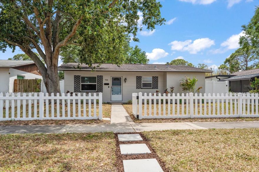 Charming, Move-In Ready Home in Desirable North St. Petersburg! Completely renovated and full of character, this 2-bedroom, 1-bath home offers stylish updates and exceptional value. Attractive wood-look luxury vinyl flooring flows throughout the bright, open floor plan. The beautifully updated kitchen features rich wood cabinetry, granite countertops, stainless steel appliances, and opens seamlessly to the living area—perfect for everyday living and entertaining. A separate dining area overlooks the spacious enclosed back porch, which leads to a picturesque gazebo and a huge, tree-shaded backyard. The fully fenced yard includes rolling gates for secure parking, while the alley-access driveway provides ample space for multiple vehicles. Ideally located with easy access to Tampa, Clearwater, and Downtown St. Petersburg, and just minutes from Publix, Target, shopping, dining, and more. Homes this updated and affordable are rare—don't wait, this one won't last!
