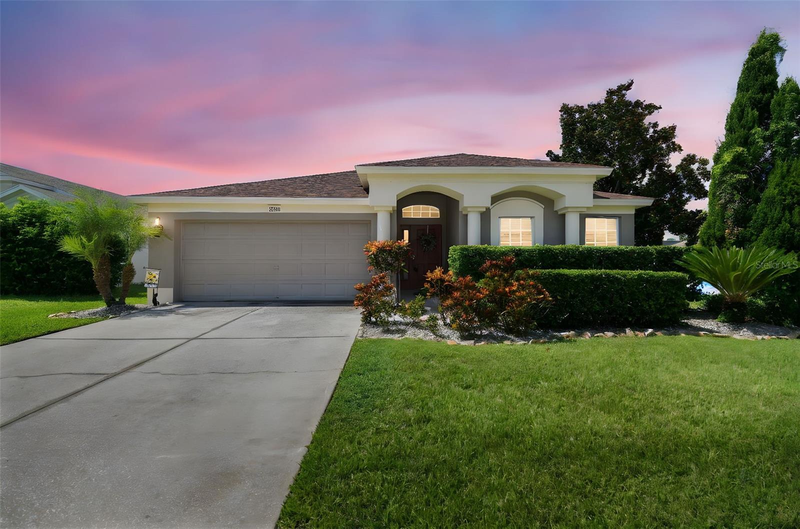 Welcome to this immaculate 3-bedroom, 2-bathroom home in the highly sought-after Palm Cove community of Wesley Chapel! Perfectly maintained and move-in ready, this home features new luxury vinyl plank flooring, an open floor plan filled with natural light, and a beautiful kitchen with granite countertops, wood cabinets, stainless steel appliances, and a spacious pantry. The primary suite offers a large walk-in closet, dual vanities, a relaxing soaker tub, and a walk-in shower. Enjoy outdoor living with a screened-in patio and fully fenced yard, ideal for entertaining or unwinding in privacy. Palm Cove boasts a resort-style pool and clubhouse, all conveniently located near top-rated schools, great restaurants, shopping, and everything Florida has to offer. Schedule your private showing today!