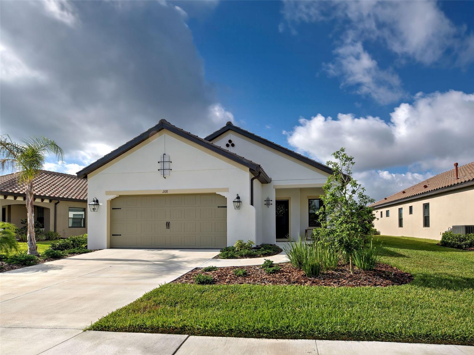 Enjoy a relaxing Florida lifestyle at its best in this gorgeous, lightly lived-in 2024 built Victory 3 bed, 2 bath, den, 2 car garage home located in the beautiful, gated Neal Community of Vicenza! This incredibly immaculate home features a serene water view and is loaded with numerous sought-after builder upgrades\options\lot premiums valued at $119K, including impact windows and doors throughout with pocketing sliders to lanai, new light and bright interior paint, fabulous wood-look tile throughout (no carpet), 5 1/4" baseboards, coffered ceiling with crown molding in Great Room, very stylish top level 1A neutral quartz countertops throughout kitchen and baths, under-cabinet LED and island pendant lighting in the upgraded Gourmet kitchen, whole house 2" faux wood window blind package, Moen fixtures and cabinet pulls, comfort height toilets with soft close seats, barrel tile roof with front gutters, foam insulation in exterior block walls, additional recessed ceiling lights and future ceiling fan boxes wired to switches, wall-mounted premium 4K TV outlets, Cat6 phone and data outlets, keyless front door entry pad, keyless garage door entry pad, garage door opener with remotes, 50 gal gas water heater, and painted garage floor. This well-planned home is also pre-plumbed with electric and natural gas for future addition of outdoor kitchen and/or pool if desired. Enjoy your morning coffee, an evening cocktail, or connect with your friends while sitting on the front porch or lounging in your lanai overlooking the pond. Upon entering this home via the upgraded front door, complete with doorbell camera, you will enter the spacious foyer, which also serves as a functional transition zone from the garage. The generously sized den/office is equipped with solid French doors, allowing for needed privacy for remote work, and is perfect for providing unlimited flexible alternatives, such as unexpected guests, craft room, home gym, or TV room. The Guest Bedrooms with walk-in closets and the Guest Bath are located in their own wing, providing guests welcome comfort and privacy. Imagine whipping up scrumptious meals in your Chef's kitchen, upgraded with GE stainless steel appliances including a counter depth 3-door refrigerator. The corner walk-in pantry and staggered cabinetry give great storage space, while the center island provides additional seating and a large single bowl sink. The Great Room is open to the Kitchen and Dining area with nice views of the water, perfect for entertaining. The Primary Bedroom and ensuite Bath are a luxurious retreat with dual vanity sinks, a generous walk-in closet, private commode room and spa-like walk-in shower. This home is favorably located on an interior premium water view lot within the beautiful northern Italian inspired Vicenza community, providing a peaceful haven for relaxation. Vicenza also provides its residents with lower HOA fees, no CDD fees, and resort-style amenities including a heated community pool and spa, a Clubhouse, Bocce Ball and Pickleball courts, and a Dog Park. This fabulous home is located in proximity to Gulf beaches, Atlanta Braves spring training stadium, historic downtown Venice, Sarasota Memorial South Hospital, Retail, Shopping, I75, area Golf courses, outdoor activities, and numerous area attractions. *Some furniture/furnishings may be available separately for sale.* *All room measurements are approximate, not guaranteed, and are to be verified by Buyer/Buyer's Representative.*