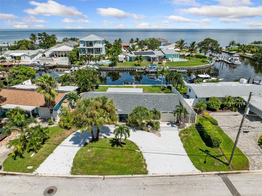 Ultimate St. Pete Waterfront Escape – Fully Furnished & Turnkey!

Make your winter getaway dreams a reality in this beautifully furnished 3-bedroom, 2-bath coastal retreat on desirable Coquina Key — available for 4 months or longer stays. Step out onto your private dock with direct, deep-water access — perfect for boating, paddleboarding, fishing, or simply soaking up the coastal breeze. From your spacious waterfront porch, enjoy breathtaking sunrises and panoramic views that set the tone for relaxed, waterfront living.  Inside, the bright open-concept layout seamlessly connects the kitchen, dining, and living spaces — ideal for entertaining or unwinding after a day on the water. The primary suite offers serene sunrise views and private porch access, perfect for quiet mornings with coffee in hand.

Location, location, location! Nestled in a peaceful neighborhood just minutes from Downtown St. Pete’s vibrant dining, shopping, and arts scene — and only a short drive to the Gulf beaches.

This turnkey rental includes all utilities (water, sewer, trash, internet, and lawn care) plus washer/dryer, garage, and a circular driveway for easy parking.  Available from late November through September.
Just bring your suitcase — everything else is ready for you. Don’t miss your chance to live the true St. Pete waterfront lifestyle.