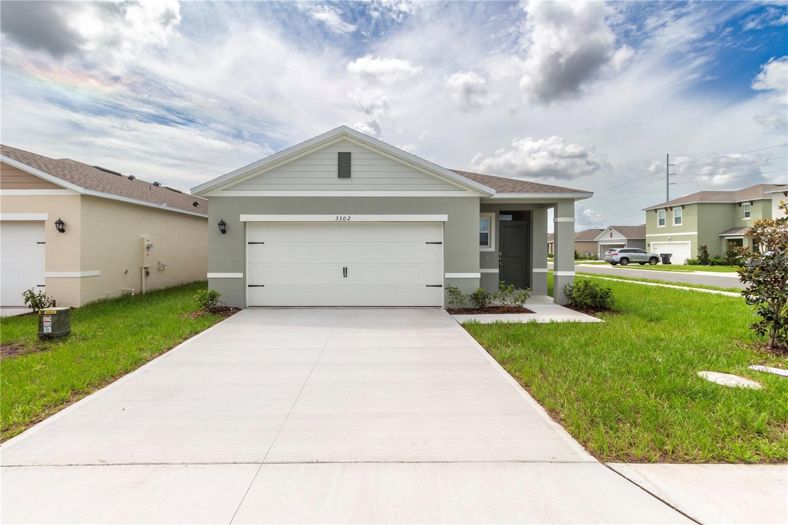 FOR LEASE! Now available in the highly desirable Lake Deer Estates community of Poinciana, this beautiful one-story home offers 4 bedrooms and 2 bathrooms with a spacious open-concept design. A welcoming front porch leads you inside, where the well-appointed kitchen overlooks the versatile great room and large covered lanai, perfect for both relaxing and entertaining. The kitchen features a generous island with bar seating, stylish cabinetry, an oversized walk-in pantry, and sleek stainless steel appliances. This home is also equipped with a smart home technology package, allowing you to conveniently control your home from your smart device whether you’re near or away. Residents of Lake Deer Estates enjoy access to fantastic amenities including a resort-style pool with cabana, dog park, and tot lot. For added value, Spectrum bulk cable and internet are included in the rent. Applications may be completed online at your convenience, with fully submitted applications reviewed in the order received. Contact us today to schedule a showing—this home will not last long! One or more photos are virtually staged.