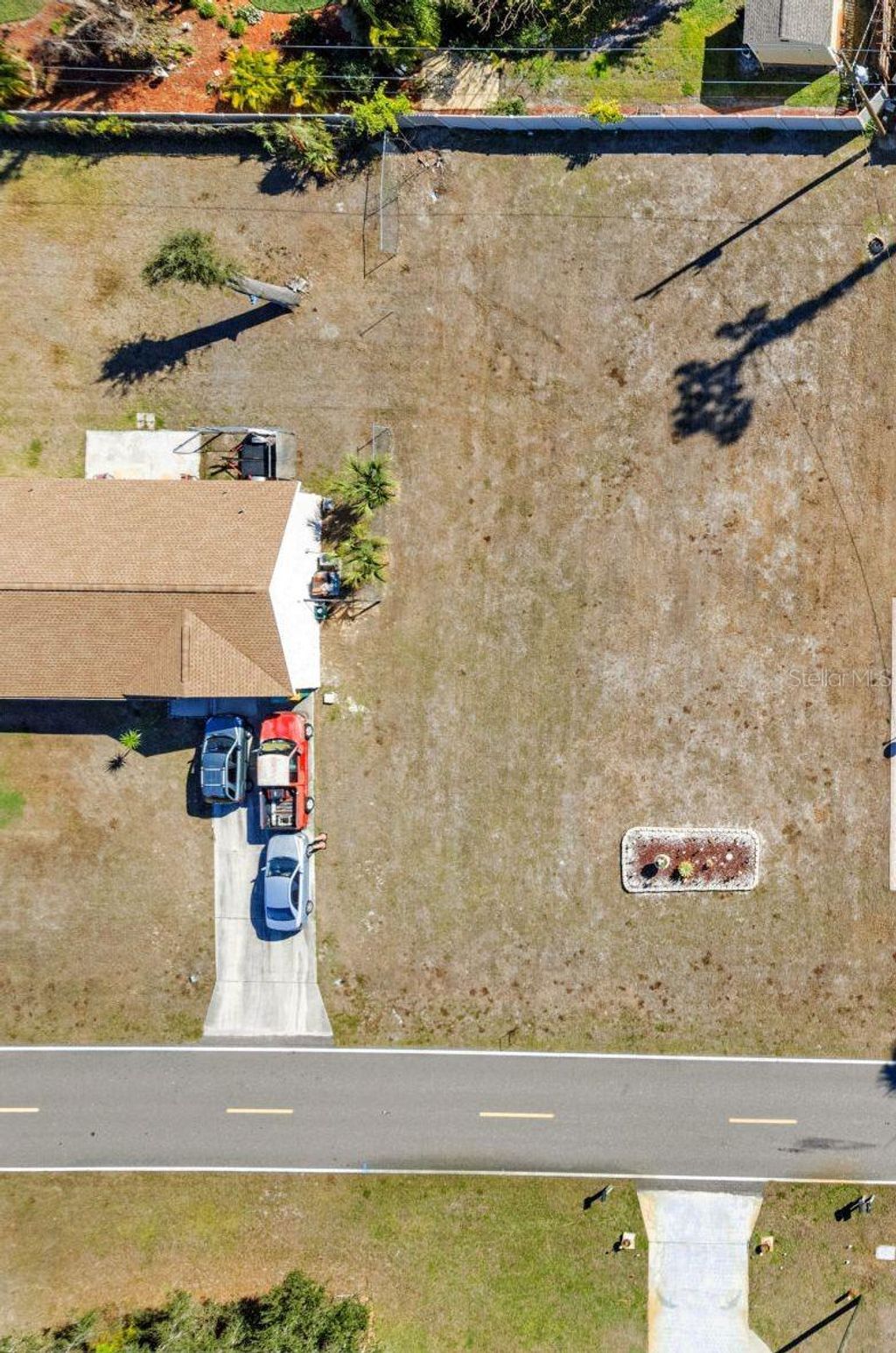 Photo of 2290 Cedarwood Street, Port Charlotte, FL 33948 (MLS # C7525475)