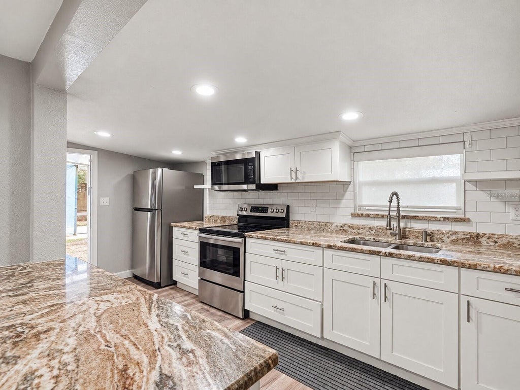 Photo of 265 Jones Road, Auburndale, FL 33823 (MLS # TB8562897)