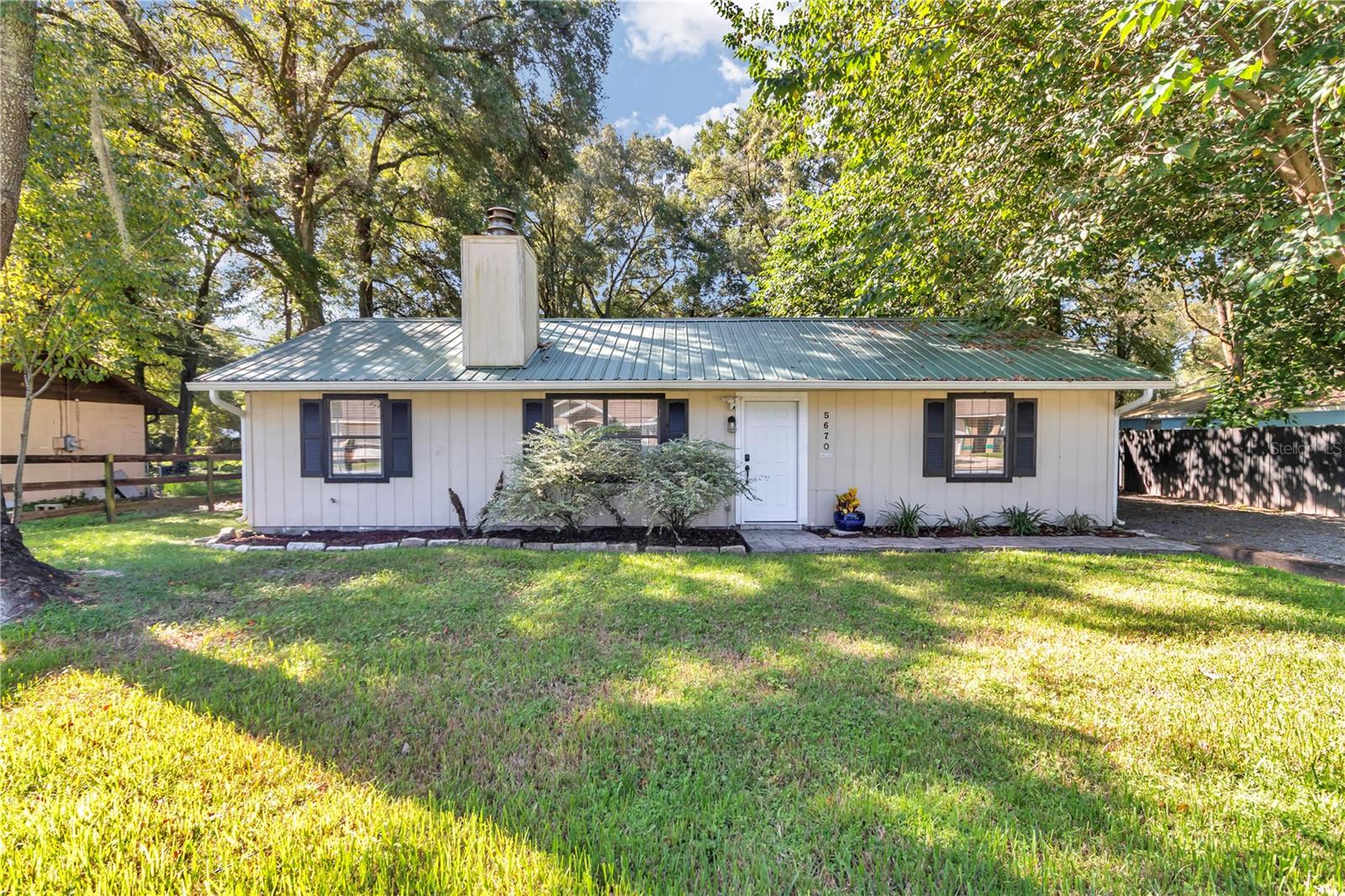 5670 NW 65TH PLACE
