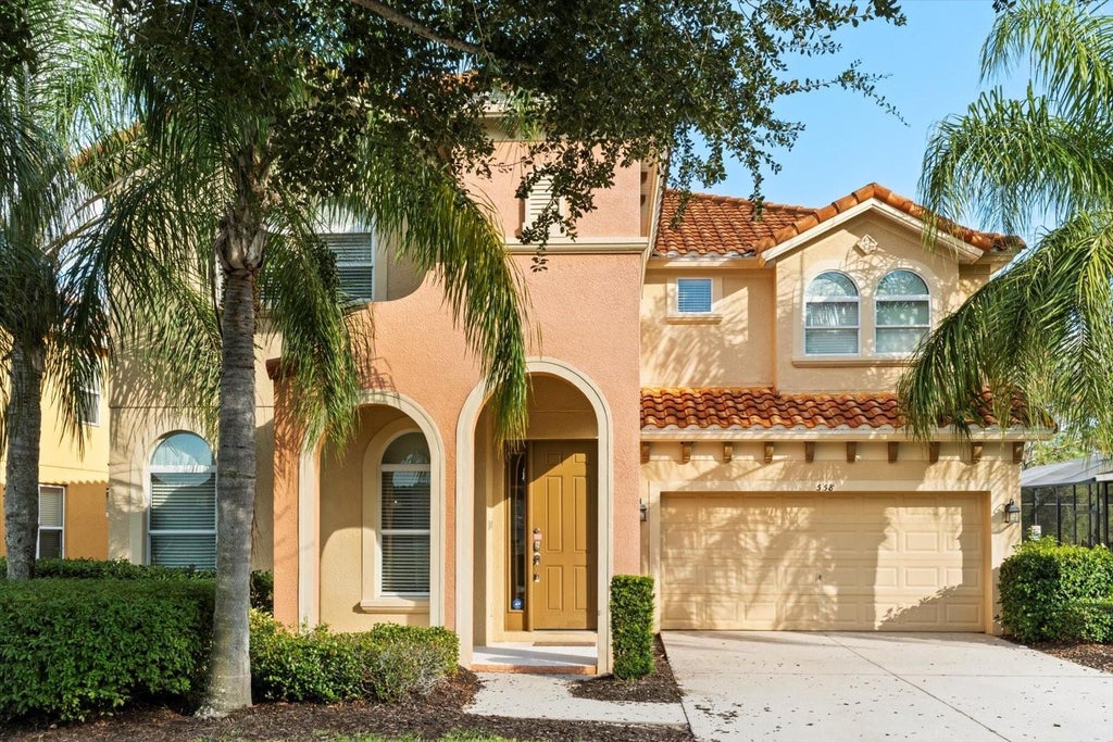 Photo of 558 Orange Cosmos Boulevard, Davenport, FL 33837 (MLS # O6440060)
