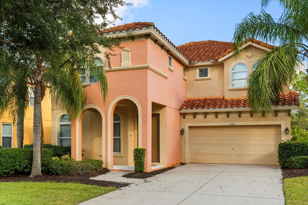 Photo of 558 Orange Cosmos Boulevard, Davenport, FL 33837 (MLS # O6440060)