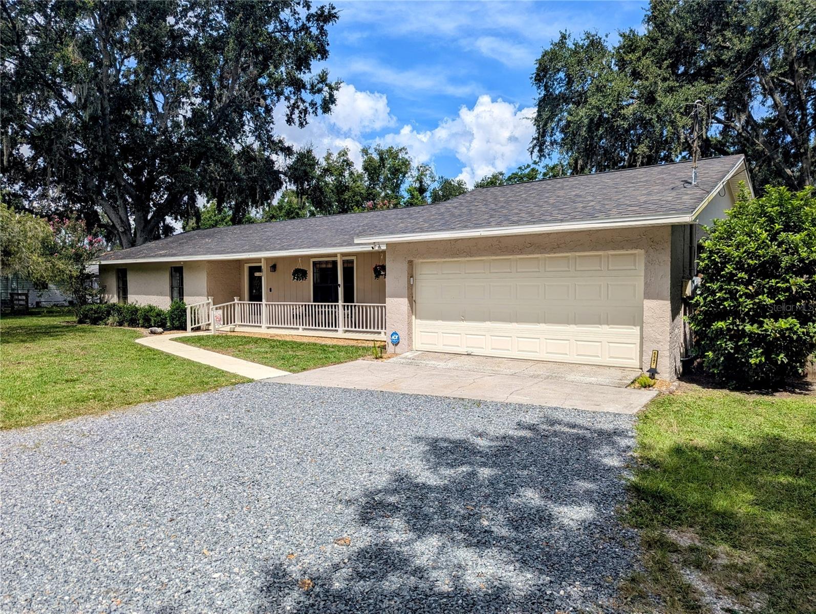 No HOA or CDD! This versatile 3-bedroom, 2-bath home sits on a fully fenced 1-acre MOL lot in the heart of Wesley Chapel. The spacious open floor plan is perfect for entertaining, featuring a large 30' x 11' screened back porch, private pool, and a 10' x 10' covered gazebo with an outdoor grill area.
The property includes a 24' x 11' shed with electric and window A/C, a bonus workshop in the garage (also A/C cooled), and a hand-operated well for irrigation. There's plenty of room for a boat, RV, trailer, or other toys — all with no deed restrictions!
Ideally located close to The Grove/Krate, The Shops at Wiregrass, Tampa Premium Outlets, Costco, Sam's Club, Epperson and Mirada Lagoons, Snowcat Ridge, TreeHoppers Aerial Adventure Park, and Interstate 75/275, this property offers privacy, space, and unmatched convenience to top area amenities.