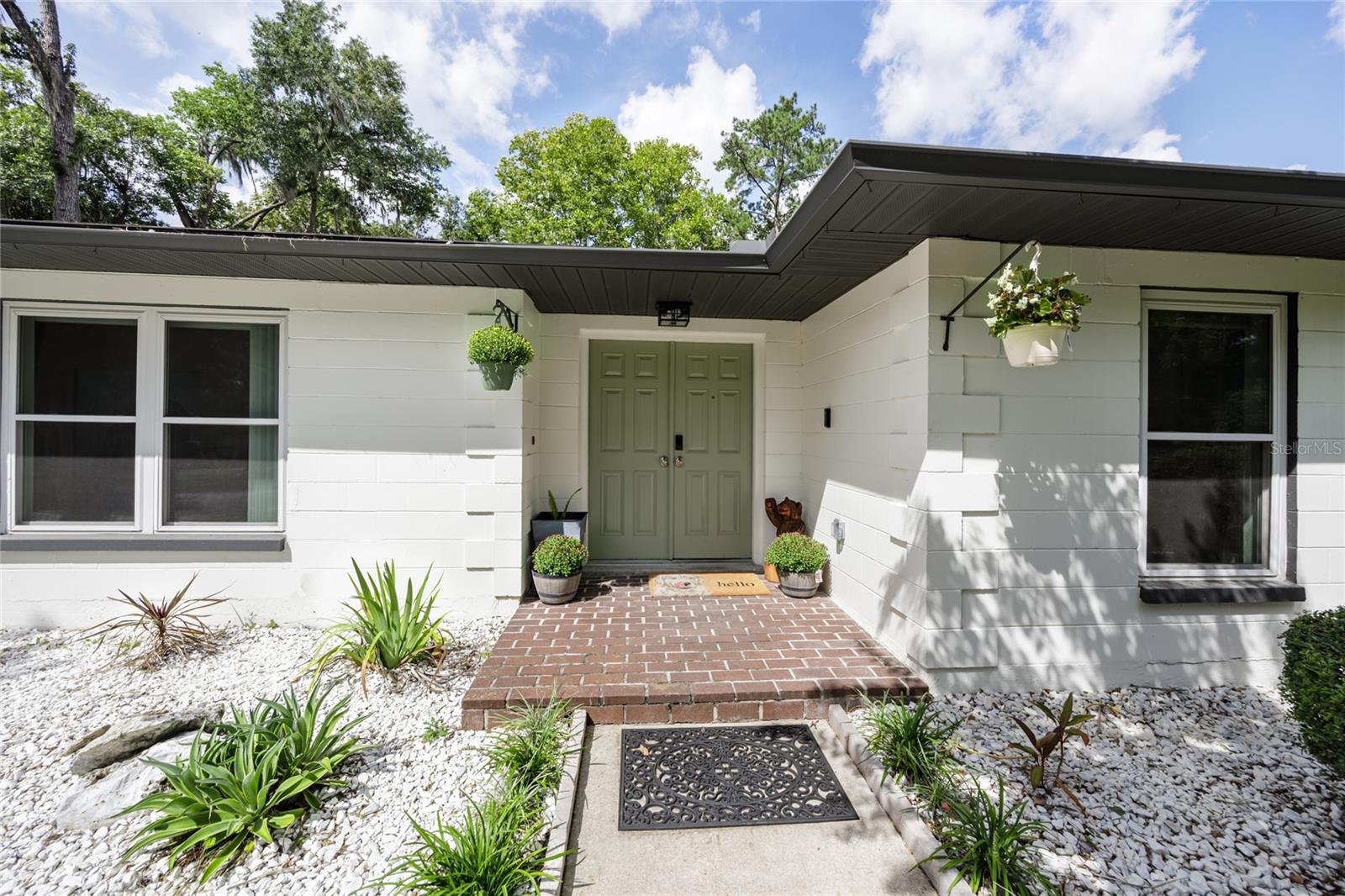 Welcome to one of Gainesville’s most desirable neighborhoods NO HOA!! —just 2 miles from the University of Florida, UF Health, and the VA.
This 4-bedroom plus office, 3.5-bath home offers the perfect blend of location, style, and peace of mind with major updates already complete: 2024 water heater, 2023 HVAC system, and 2019 roof. Child-proof outlets have been installed throughout the home, and the kitchen, bathrooms, and laundry room have all been thoughtfully remodeled. Inside, you’ll find a fresh and inviting atmosphere with modern finishes, open living spaces, and abundant natural light. The updated kitchen features sleek cabinetry, contemporary counters, stainless steel appliances—including a double oven—and a filtered hot water dispenser. The bathrooms have been beautifully redone with stylish tile and fixtures, and even the master vanity includes built-in electrical outlets for convenience. The upgraded laundry room adds ease to everyday living. Step outside to enjoy a private, fenced backyard—perfect for gatherings, gardening, or simply relaxing under the shade of mature trees. Not only are the big-ticket items taken care of, but this neighborhood is also cherished for its tree-lined streets, established character, and unbeatable convenience to UF, Midtown, and Downtown Gainesville.
This home is truly move-in ready and waiting for its next chapter. Forest Ridge.