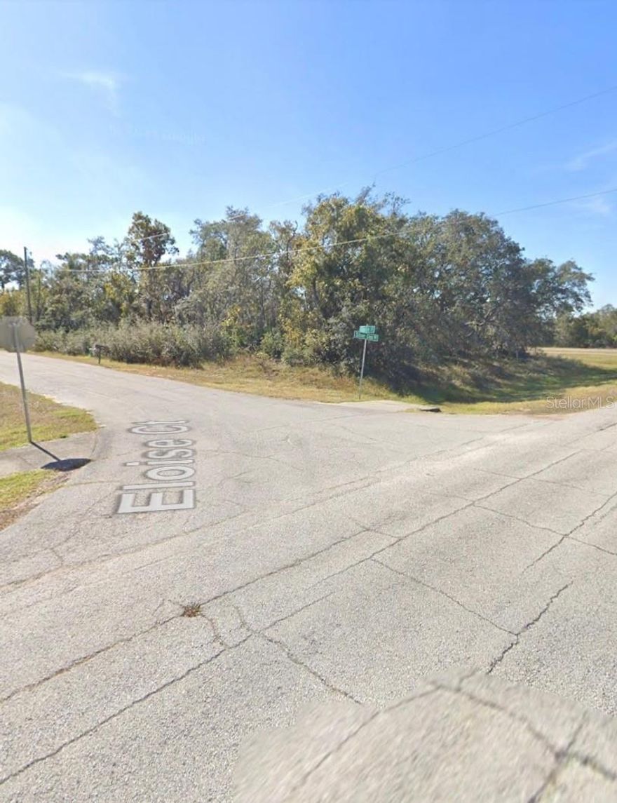 Nice Corner Lot, Neighborhood 2, Village 7 in Polk County. Nearly  a quarter of an acre, all high and dry in desirable area, close to Lake Marion Golf Resort.  Home prices starting in mid $200's.  Address should be 1541 Eloise Ct.