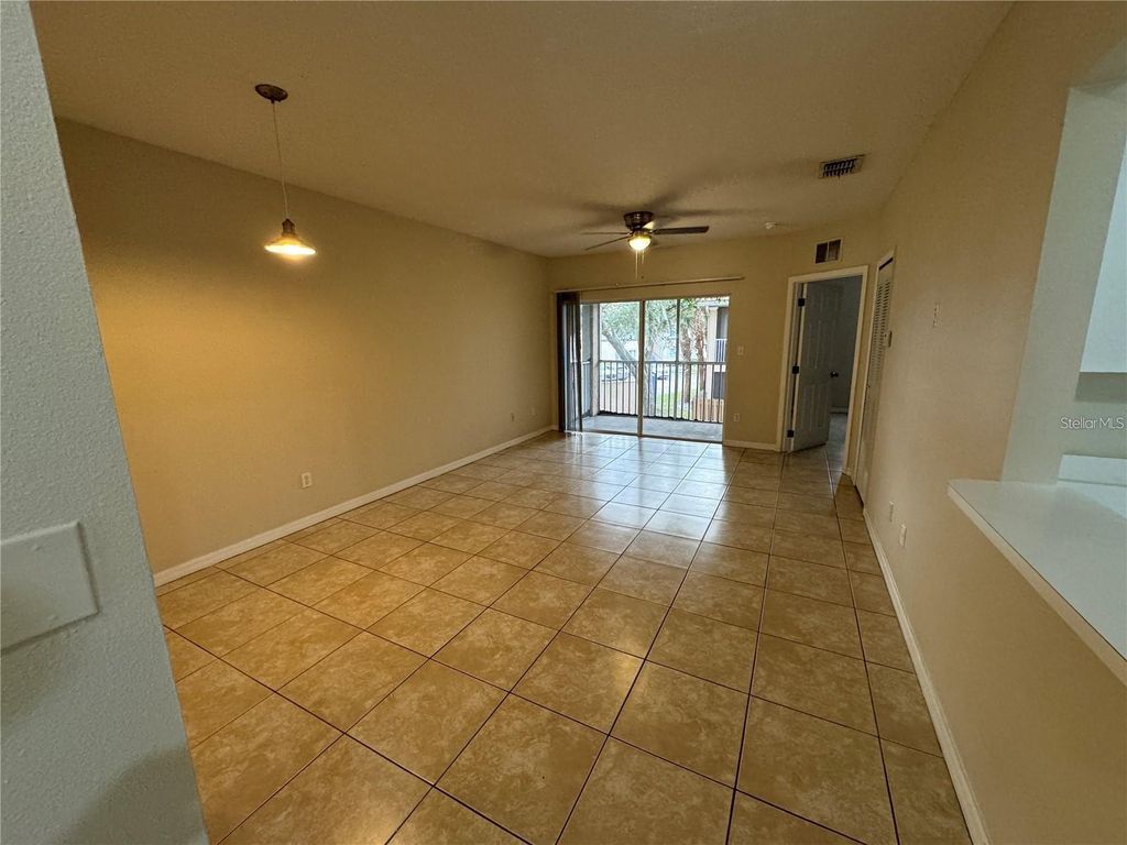 Photo of 13216 Villa Vista Drive #201, Orlando, FL 32824 (MLS # O6379139)