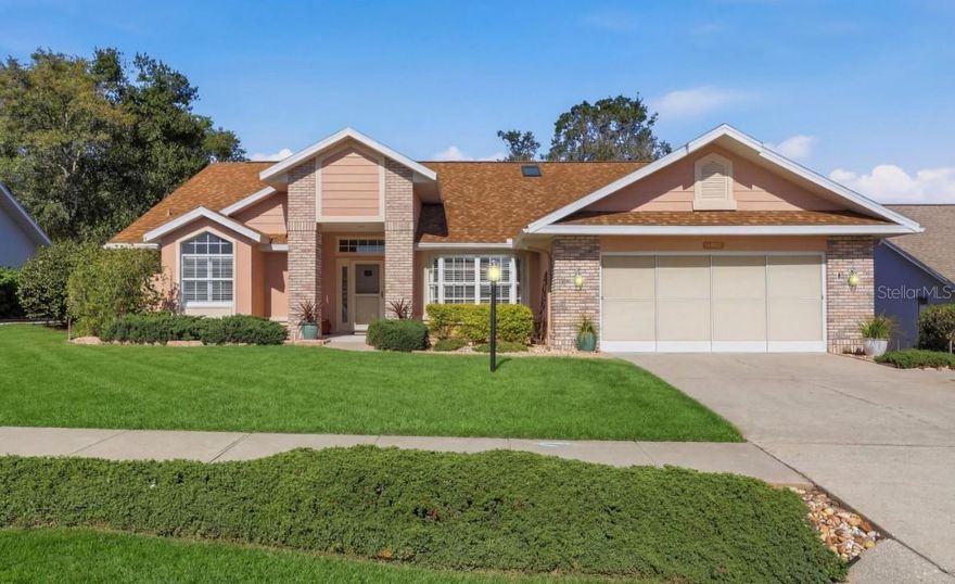 FLAWLESS!..A PICTURE PERFECT, move-in ready Rusaw Built Home featuring the Oakdale Model floorplan! This impeccable 3BD/2BA, 1,757sqft beauty sits on a .24-acre homesite in the hidden treasure of Oak Ridge, where community pride and care are evident & you can enjoy “Quality Living in a Community That Cares”! A blend of natural elements with full landscaping & bordered flower beds, and enhanced aesthetics with the hip roof, gables and brick accents, create an undeniable curb appeal that catch your eye. Upon entry, the freshly painted welcoming hues, with the beige of the sand and dabs of blue for the sky, along with the vaulted ceiling and natural light from the numerous transoms and skylights, are alluring. The upgraded lighting fixtures & plant shelves throughout add a distinctive touch! A treat awaits, for the cook of home, with an efficient, stylish kitchen which features luxury vinyl planking, plenty of cabinetry, quartz countertops, S/S appliances including a newer convection oven, pencil tile backsplash & pantry cabinet. The nook is super convenient for casual meals or afternoon brunch and card game, while the formal dining room, with a bay window and plantation shutters, is perfect for those special guests. The laundry room with upper cabinets and utility sink is handy. The master bedroom boasts laminate flooring, slider, dual walk-in closets and an ensuite with dual sinks, jetted tub and a separate tiled shower. Last, but not least, your private retreat awaits on the 31’x10’ covered, screened porch with 2 skylights, transoms, tiled flooring and retractable hurricane shutters, just in case. NO FLOOD ZONE! NEW ROOF & SKYLIGHTS IN FEBRUARY 2026 & HVAC replaced in 2022. Misting system on a timer for the flower gardens and a newer 2021 garage door are a plus! So much to do in a community where neighbors are friends! The clubhouse features a library, meeting room, TV room, billiards room, kitchen, community pool, gazebo, park, & lighted tennis/pickleball courts. Sidewalks throughout the community are perfect for your morning or evening constitutional. Centrally located with immediate access to CR491, which is the significant connector from the Hernando-Citrus County Line to SR200, the gateway to Ocala ! All within a 5-mile radius there’s hospital facilities, pharmacies, public library & golf courses. Citrus County’s BRAND-NEW retail hub, The Shoppes at Black Diamond featuring many well-known retailers, as well as some of your favorite big box stores is less than 10 minutes away. Only 25 minutes to Crystal River to visit Three Sister Springs & Hunter Springs Park for boating, fishing & the only place to SWIM W/ THE MANATEES! FREE 1-year HOME WARRANTY for PEACE OF MIND is OFFERED to the BUYER!