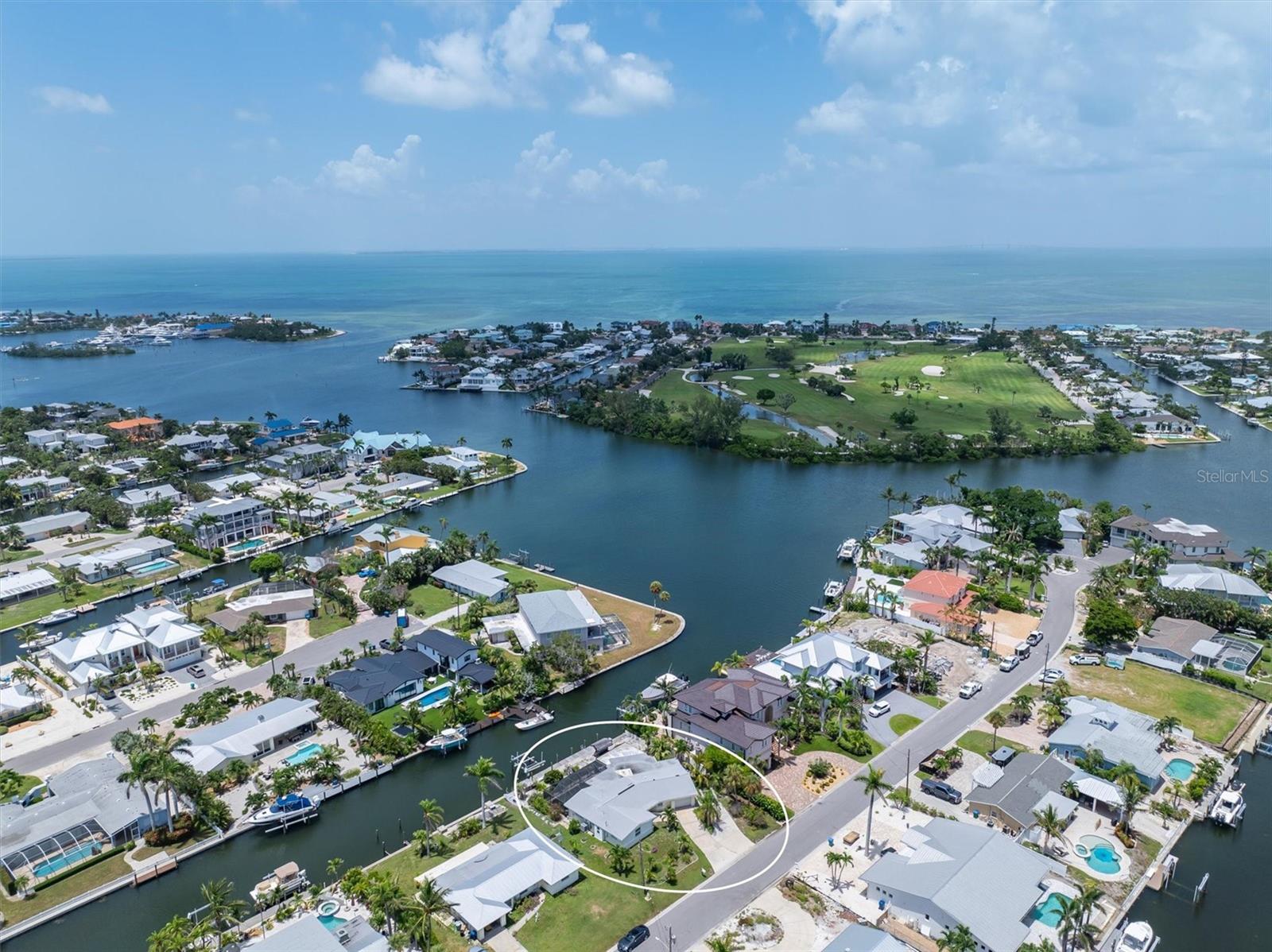 The water is calling your name! Being sold for lot value, make your dreams come true and get creative with this 8,755 sq ft lot. Canal front on a quiet street ready for remodel or rebuild and design exactly what you want. There currently is a home on the lot, but it has not been remediated or fixed since the hurricanes. Direct access to Bimini Bay and the Gulf. There is a dock and boat lift. Come live the Island life and enjoy all that Anna Maria Island has to offer! Zoning allows for monthly vacation rentals.