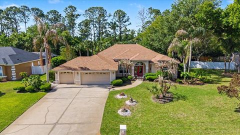 Photo of 11 Crescent Lake Way, Ormond Beach, FL 32174 (MLS # FC317797)