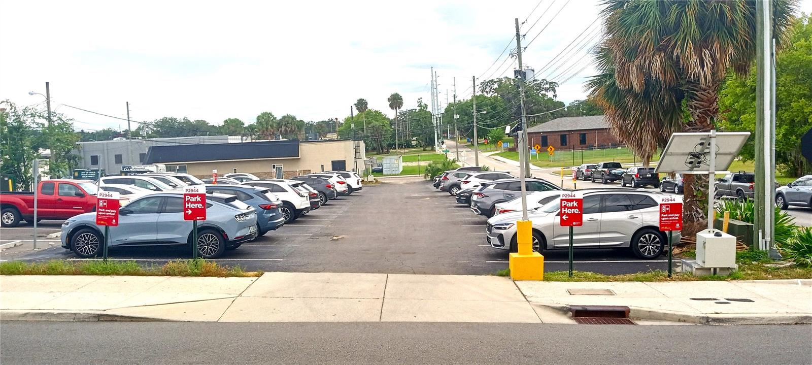 In the heart of fast growing downtown Ocala for sale is this fully functioning 45 space parking lot. This parking lot is vital to the downtown area and provides a great location for visitors. Weekends, holidays and events bring parking challenges with the towns main garage even reaching full capacity. The parking equipment is currently leased and the buyer can continue the lease or have the equipment removed. The parking lot can be redeveloped into 12 Town homes, 20+ condos, Mixed-Use, Restaurant, Bar, Brewery, Spa Salon, Boutique Hotel, Event Venue and more if desired. The owner has designed the site for a future 24 unit apartment project but you could do whatever you want with the property. The Concept design is included with the sale. The seller has a recent survey available which also would be transferred with the sale along with an Environmental study indicating the site is clean. Across the street, 110 SW Fort King (vacant lot) is also for sale by the same owner. See MLS listing OM707230 The property value for this property will only increase with time as more nearby land gets redeveloped. The seller has a concept design and 3D images for the proposed design available.
