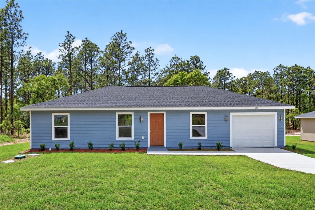 Photo of 23393 NW Shamrock Avenue, Dunnellon, FL 34431 (MLS # OM733579)