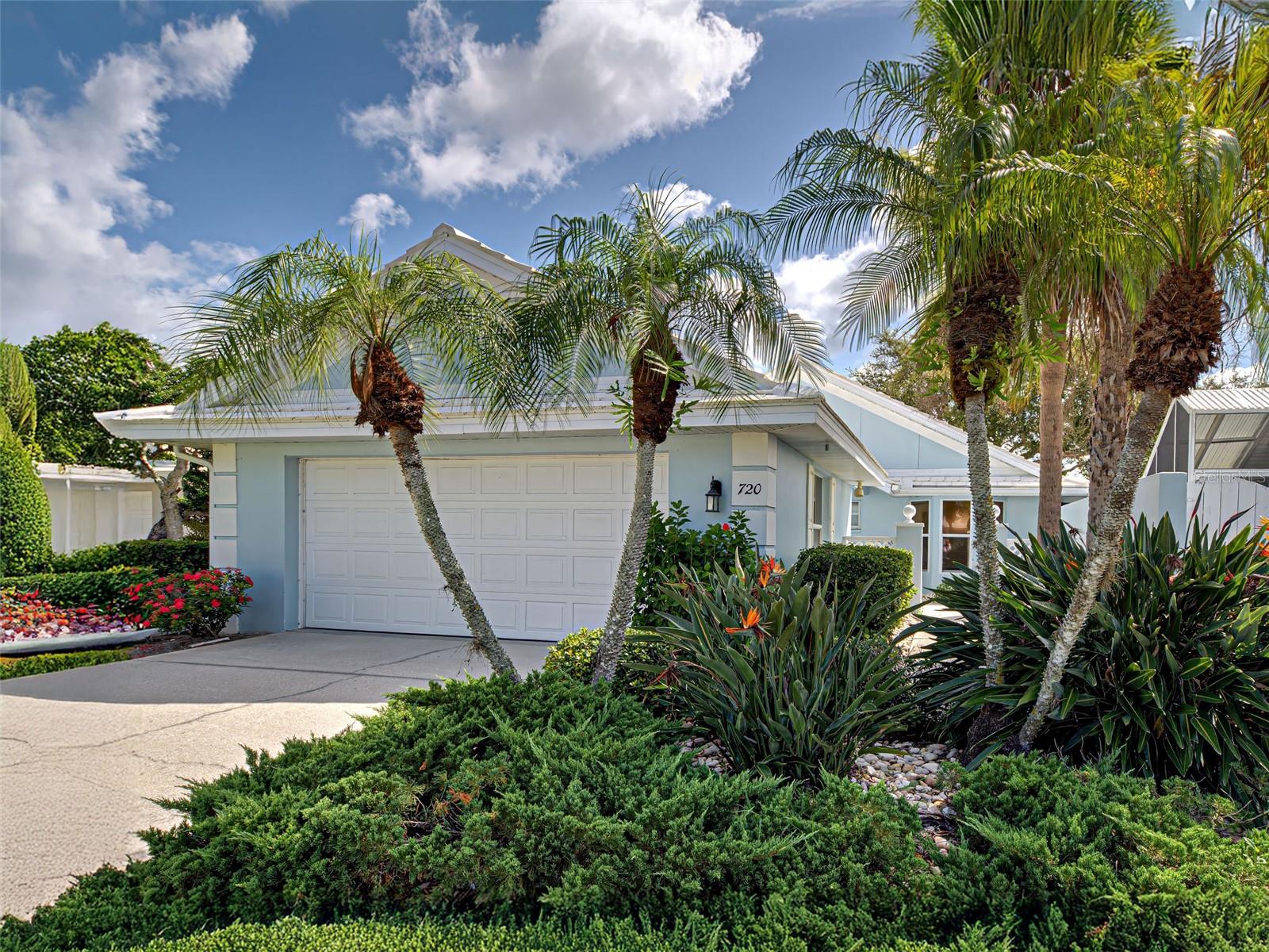 Welcome to the Villas of Somerset at Plantation Golf and Country Club! This spacious 2-bedroom, 2-bath villa with an office/den and soaring ceilings offers the perfect blend of comfort and lifestyle. Enjoy a light-filled eat-in kitchen with classic white cabinetry, a two-car attached garage, and the timeless appeal of a tile roof. The primary suite features a bay window with built-in cabinets and shelving, along with an ensuite bathroom that includes a double sink vanity, stall shower, and a separate soaking tub. Situated along the fairway, this home offers scenic golf course views and access to a beautifully maintained, resort-style community. Residents of the Villas of Somerset enjoy a sparkling pool and clubhouse. Optional membership at the Plantation Golf and Country Club offers even more, including golf, tennis, pickleball, bocce ball, an Olympic-sized pool, and a state-of-the-art fitness center. Carefree, maintenance-free living at its finest. Don’t miss this incredible opportunity!