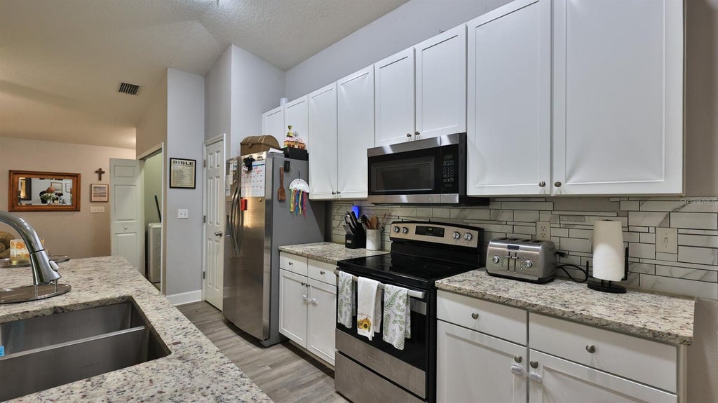 Photo of 1565 Schaub Avenue, Orange City, FL 32763 (MLS # O6452073)
