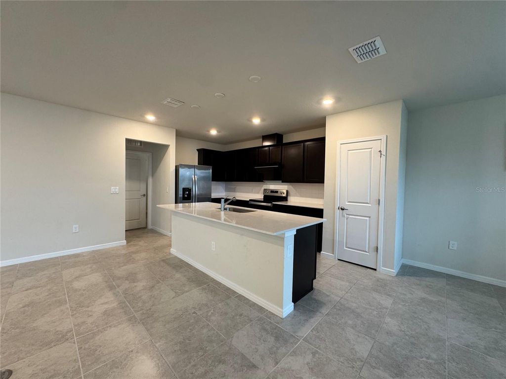 Photo of 2102 Charming Ave, Davenport, FL 33896 (MLS # O6400556)