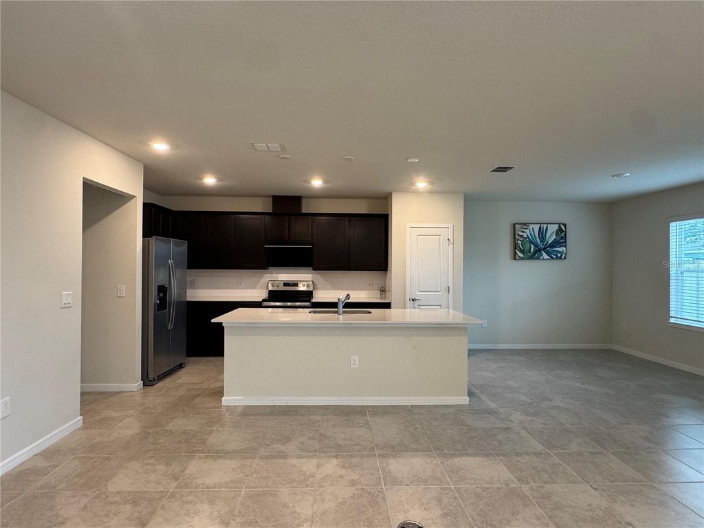 Photo of 2102 Charming Ave, Davenport, FL 33896 (MLS # O6400556)