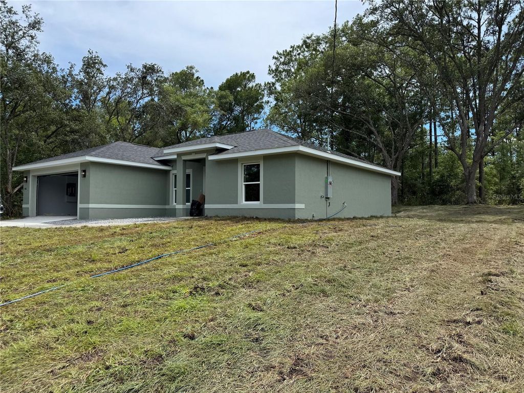 Photo of 252 Locust Road, Ocala, FL 34472 (MLS # OM714250)