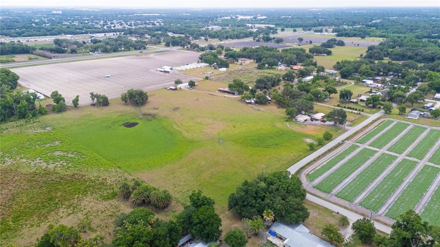 Country charm, wide open skies, and room to build the lifestyle you’ve been dreaming about. Spanning over 13.5 acres in Plant City, this rare property offers TWO homes, a massive 100x24 barn, and endless possibilities for multi-generational living, income potential, or creating your own private ranch retreat.

As you enter the property, you’re welcomed by a charming 2-bedroom, 1-bath country cottage full of warmth and farmhouse character. Tucked farther back on the land sits a double wide mobile home currently being used for storage with future potential for guest quarters, rental income, or additional living space.

The impressive 100x24 barn is ready for equipment, animals, hobbies, storage, or all the toys that come with country living. Bring the horses, cows, chickens, goats, trailers, RVs, and side-by-sides because this property was made for wide open living. From quiet mornings on the porch to sunsets over the pasture, this is the kind of place that feels like your own private escape from the busy world.

Peacefully tucked away while still conveniently located near I-4, shopping, dining, and Downtown Plant City, this property offers the perfect blend of country living and everyday convenience. Opportunities like this are becoming harder to find.