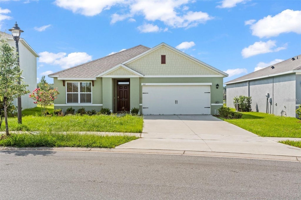 Photo of 1112 Fox Path, Davenport, FL 33837 (MLS # O6443841)