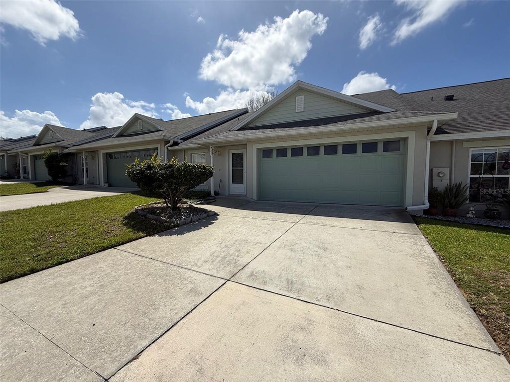 Photo of 261 Brookdale Loop, Clermont, FL 34711 (MLS # O6396445)