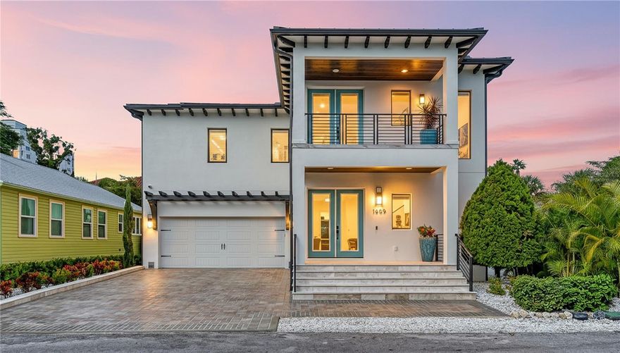 One or more photo(s) has been virtually staged. Welcome to 1659 Devonshire Lane in the heart of Downtown Sarasota's Laurel Park neighborhood. This beautifully designed 2,754 sq. ft. residence completed in 2024  offers four spacious bedrooms and three and a half bathrooms, blending elegance with functionality. The open-concept kitchen and living area are perfect for entertaining and showcase premium stainless steel Thermador appliances, including a gas range with hood and a built-in coffee/tea beverage center for added convenience, additionally a walk-in pantry adds ample storage and the large kitchen island accommodates up to seven, a separate ice maker and two wine coolers that can accommodate over 200 bottles. Step outside to your private oasis featuring a heated saltwater pool enhanced by four fountains, a waterfall feature and colorful lights that enhance the pool at night and a beautiful outdoor kitchen, all set within gracefully textured stucco walls, perfect for entertaining. Enjoy added conveniences such as a full-house Generac backup generator, reverse osmosis water filtration system under the kitchen sink with separate faucet for drinking, and a water softener/filtration system. Constructed entirely of block with cat 5 hurricane windows, stucco exterior and durable metal roof, this home boasts quartz countertops throughout, an irrigation system, and a two-car garage with epoxy flooring. The outdoor spaces are equally impressive, with a marble pool deck on a concrete base, a covered marble front porch, and two balconies—one front and one rear—featuring ceiling fans and porcelain tile flooring. Additional amenities include a half bath off the pool deck and outdoor shower for added convenience.  The primary suite offers a luxurious ensuite bath and a large walk-in closet, creating a serene retreat within this exceptional property.  The two upstairs guest bedrooms are separated by a Jack and Jill bathroom with dual sink vanity and a large walk-in shower with a separate handheld sprayer, bench seating and a window for natural light. The first floor bedroom can be used as office or den with an attached full bathroom with walk-in shower with separate handheld sprayer.  All of this located in the heart of downtown Sarasota just 4 blocks to Main Street and 1 block to Historic Burns Court shops and restaurants. Just one block to Marie Selby Botanical Gardens and a short walk to Bayfront Park and Marina. A two mile drive takes you across the John Ringling Causeway bridge to Lido Beach and St Armands Circle and a short 15 minute drive south takes you to the world famous Siesta Key Beach. This highly sought after convenient location in downtown Sarasota won't last long so book your tour today!! Some photos have been virtually staged.  All measurements are approximate and should not be relied upon as exact.