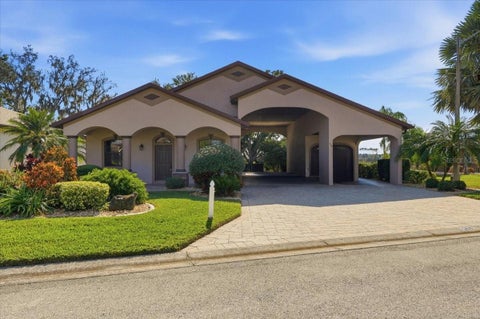 Photo of 584 Meandering Way, Polk City, FL 33868 (MLS # L4964050)