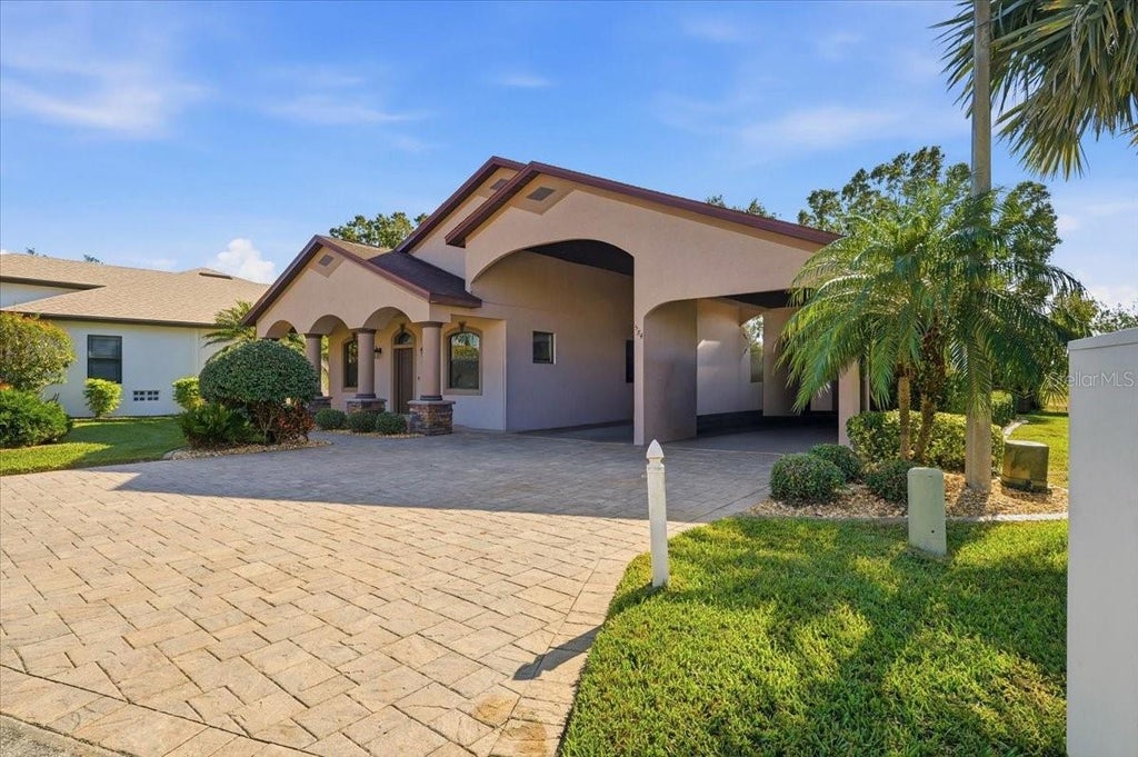 Photo of 584 Meandering Way, Polk City, FL 33868 (MLS # L4964050)