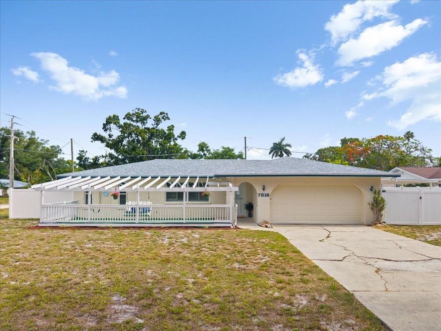 Tucked into sought-after Northwest Bradenton, this versatile 3-bedroom plus office/bonus room home offers the rare combination of oversized outdoor space, coastal convenience, and flexibility for everyday living or income-producing potential. Set on a generous .31-acre corner lot, the property is designed for those who need room for all the extras — from RVs and boats to jet skis and weekend toys — with two separate double-gated entries, covered carport storage, and 30-amp RV service already in place.
Inside, the split-bedroom floor plan creates privacy while the open living spaces make everyday living feel connected and inviting. The updated kitchen anchors the home with an open layout, breakfast bar seating, and seamless flow into the main living area, where plantation shutters frame the natural light and add timeless character. The primary suite is privately positioned and features abundant sunlight, a spacious walk-in closet, and an ensuite bath with convenient access to both the bedroom and garage — ideal after a day at the beach, boating, or poolside entertaining.
Step outside and the possibilities expand. The oversized backyard offers plenty of room to create your own private retreat, with space for a poolside gathering, play area, boat parking, or additional storage. The large pool deck is ready for entertaining, while the fenced front porch with a charming swing creates a welcoming place to unwind and enjoy Florida evenings.
Recent updates include fresh exterior paint and a new roof in 2026, complete with hurricane clips to maximize wind mitigation insurance credits. Located in an X flood zone, this property offers the advantage of being close to the water without the burden of required flood insurance. Just about a mile to the Palma Sola Causeway and less than five miles to Anna Maria Island beaches, this home delivers the Florida lifestyle buyers are searching for — whether as a primary residence, vacation getaway, or short-term rental investment opportunity.