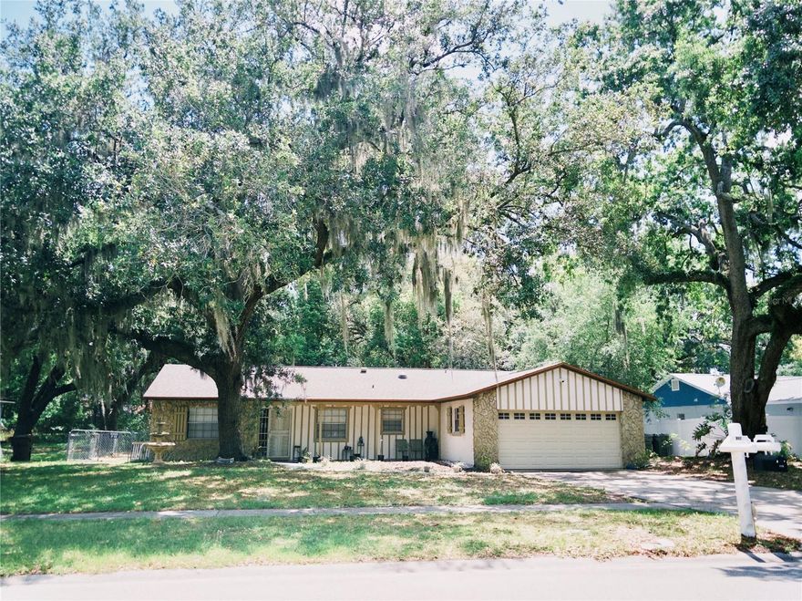 Seller is offering 10k for closing costs assistance or interest rate buy down - Welcome to your slice of Florida paradise, with NO HOA! This upgraded home features a new roof, AC, and water heater (2025), along with a modern kitchen showcasing granite countertops, granite backsplash, stainless steel appliances, and tile flooring throughout. Set on a large conservation lot with a serene creek, the property includes a large 2-car garage, screened patio, fire pit, creekside grill, and plenty of shaded garden space for your plants.

The oversized yard offers exceptional flexibility — perfect for pets, an RV, or even adding an ADU — and with no HOA, you have the freedom to make it your own. Located just minutes from the Turnpike, major highways, shopping, grocery stores, and restaurants, this move-in-ready home delivers the ideal blend of privacy, convenience, homestead lifestyle, and modern comfort. Schedule a tour today!