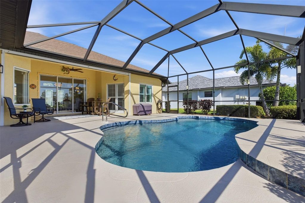 Photo of 74 Broadmoor Lane, Rotonda West, FL 33947 (MLS # C7523667)