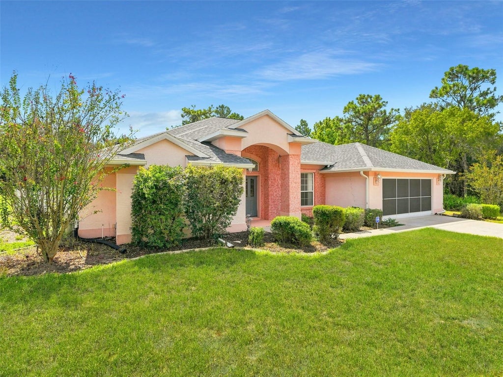 Photo of 56 Oak Village Boulevard, Homosassa, FL 34446 (MLS # W7889100)