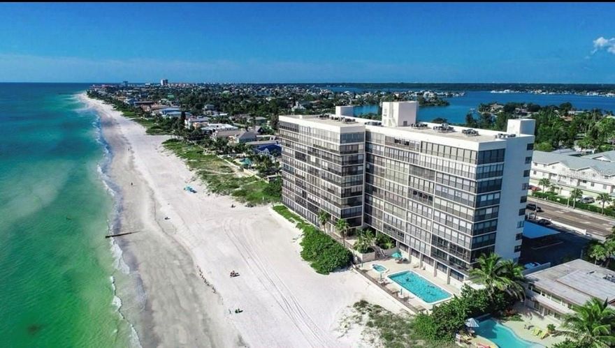 Come live the ultimate beach life!! Spend the days in the sun on the beach and enjoy the gorgeous sunset every night from your private balcony in this beautifully maintained and updated 2 bedroom/2 bathroom beachfront condo. This fully furnished unit boasts a full updated kitchen with everything you may need including a newer dishwasher and washer/dryer. Brand new luxury vinyl plank flooring throughout the unit, fresh paint, a newer living room set, and gorgeous furnishings will make you feel right at home. The building offers a secured entry with a large lobby area, game room, and fitness center. This unit includes one reserved garage parking space and plenty of parking for your guests. Conveniently located to grocery stores, restaurants, shopping, entertainment, and everything you can experience in a vibrant beach town. The unit is available JULY 1ST - DECEMBER 31ST. Minimum rental is one month.