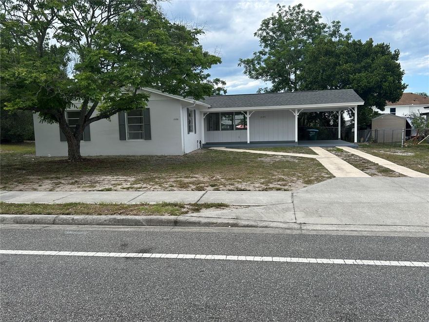 Wow, this house has a new roof, refinished terrazzo floors, new kitchen with new appliances, updated plumbing & electrical plus so much more. Move right in and enjoy this cute gem. Screen porch on the back plus a utility room off the carport.