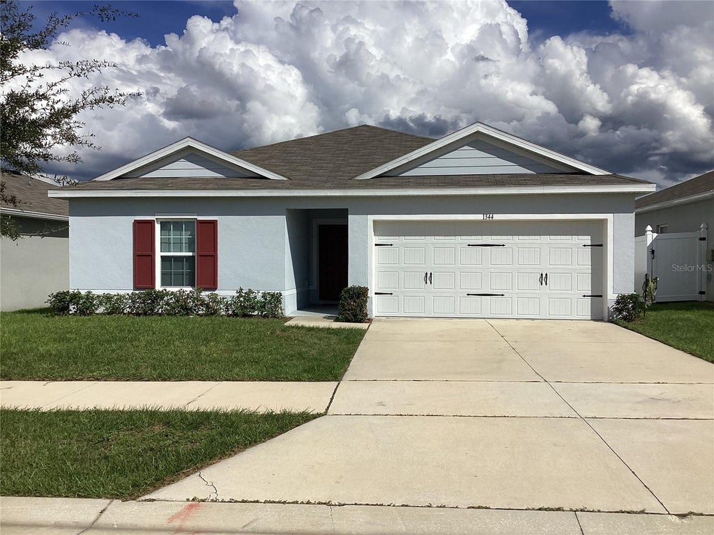 Photo of 1344 Madison Circle, Haines City, FL 33844 (MLS # S5159488)
