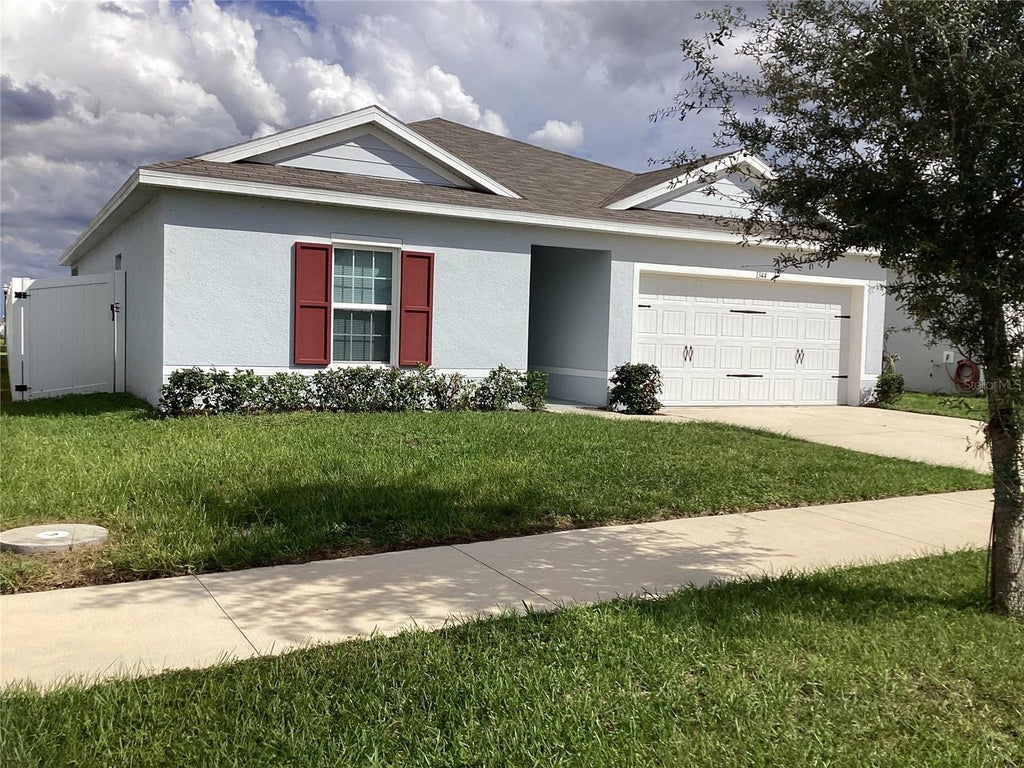 Photo of 1344 Madison Circle, Haines City, FL 33844 (MLS # S5159488)