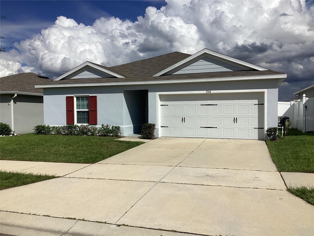 Photo of 1344 Madison Circle, Haines City, FL 33844 (MLS # S5159488)