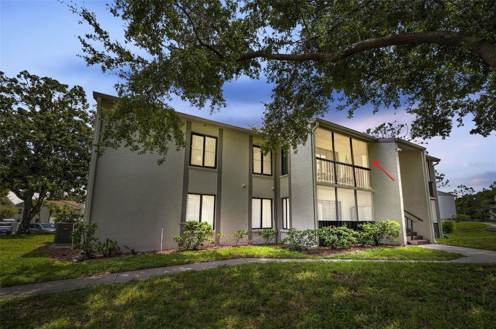 Impeccably updated 2-Bedroom, 2-Bath condo in the desirable Pine Ridge at Palm Harbor, A Pet-Friendly 55+ Community! Discover one of the finest condos currently available in Pine Ridge at Palm Harbor, a well-maintained, active retirement community. This beautifully updated second-floor unit overlooks the peaceful courtyard and is conveniently located just steps from the community pool and clubhouse. Move-in ready, this residence features a spacious and light-filled living area with additional windows and sliding glass doors leading to a screened and enclosed patio, ideal for enjoying the Florida lifestyle. High-quality, wide plank wood laminate flooring flows through the living room, dinette, and hallway, while neutral carpet provides comfort in both bedrooms. The generously sized primary suite includes a walk-in closet and an ensuite bath, thoughtfully updated in 2018 with a custom vanity, granite countertop, updated lighting, and mirror. The secondary bedroom also offers a walk-in closet and is adjacent to a stylishly renovated guest bath (2019) featuring a custom wood vanity, updated light fixture, and mirror. The kitchen, renovated in 2018, boasts custom solid wood, soft-close cabinetry, granite countertops, and recessed lighting. Appliances include a range and dishwasher (2019), microwave (2018), and refrigerator (2023). Additional updates include raised panel interior doors (2021), Pella sliding windows throughout (2022, excluding patio sliding door and small dinette window), a water heater (2016), and an HVAC system (2020). An in-unit laundry closet with washer and dryer adds to the convenience.
Enjoy peace of mind with a low monthly HOA fee of $439, which covers roof maintenance, cable, internet, water, sewer, trash, exterior building maintenance and pest control, access to the heated pool and spa, clubhouse, and on-site property management. All room dimensions are approximate. 1,150 sqft. includes the enclosed patio. Call today for your in-person or live virtual tour!