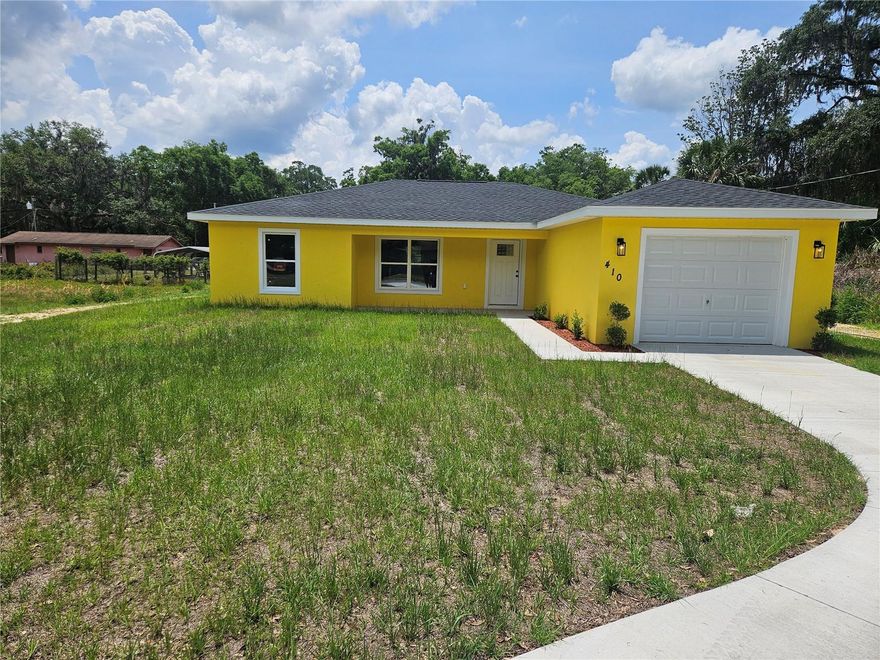 This newly built custom home built in 2024 comes with a stainless steel refrigerator, Range, Microwave, and dishwasher! The kitchen also features granite counter tops and a spacious island. This home has a cozy dining room with a view to the back yard through the sliding glass doors. The master bathroom also features your walk in closet.
