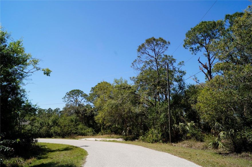 Build-ready 0.30-acre single-family residential lot in fast-growing North Port, Sarasota County, with a clean environmental report on file - no gopher tortoises, scrub jays, or protected heritage trees identified, clearing one of the most common permitting hurdles for Florida vacant land. Power available at the street; well and septic to be installed (standard for the area). Established neighborhood with existing single-family homes along Chorley Ave. The rear of the property adjoins the I-75 corridor with a mature native tree buffer providing a natural privacy screen between the lot and the highway. That same proximity translates to exceptional commute access - Sarasota, Venice, Port Charlotte, and Fort Myers are all a quick interstate drive away. Minutes from Cocoplum Village Shops, Wellen Park, CoolToday Park (Atlanta Braves spring training), and Warm Mineral Springs. Manasota Key and Gulf beaches approximately 20–30 minutes west. Bring your builder. Buyer should verify all details. Listing agent has an ownership interest in the property.
