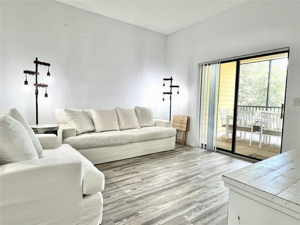 Photo of 9055 Treasure Trove Lane #207, Kissimmee, FL 34747 (MLS # S5152990)
