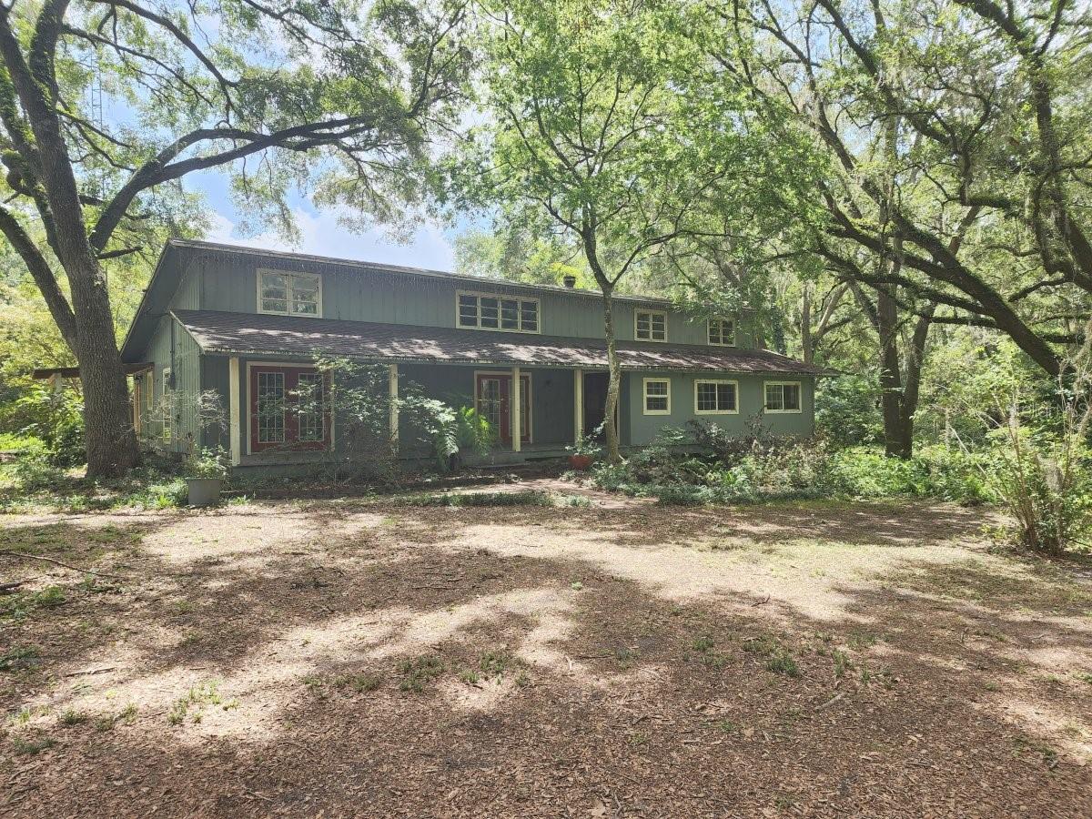 Cute 3/3 on over 5 pretty acres. The home has a spacious layout that is perfect for entertaining. The primary suite has a large walk-in shower. There are buildings on the property that can be used for storage or a workshop. There is room for pets and gardening. * AGENTS: Read the instructions in Stellar. * BUYERS: Your agent will schedule your showing. This property is located on a private drive. DO NOT go onto the property without permission.