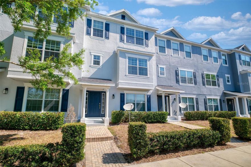 Welcome to this meticulously kept three-story townhome located in the desirable Legacy Park community in Casselberry! Offering the perfect blend of space, style, and convenience, this home features a flexible floorplan with a spacious guest suite on the main level — ideal for visitors, a home office, or multigenerational living.

Upstairs, you’ll love the open-concept living spaces accented by newer engineered hardwood floors and abundant natural light. The kitchen has been thoughtfully refreshed with appliances replaced in 2024, creating a modern and functional space for everyday living and entertaining. A standout feature is the custom built-in bar area, adding character and the perfect spot to host friends and family. Step outside to the oversized balcony, ideal for enjoying your morning coffee or relaxing in the evenings.

This meticulously maintained home also offers valuable updates including a 2022 roof and 2023 A/C for added peace of mind. The spacious two-car garage provides ample parking and storage space.

Legacy Park residents enjoy access to wonderful community amenities including a resort-style pool and neighborhood park/playground area. Conveniently located near shopping, dining, Seminole County parks, and major roadways including 17-92 and SR-417, this location makes commuting to Orlando, Winter Park, and surrounding areas a breeze. This move-in ready home truly offers low-maintenance living with all the space and upgrades you’ve been looking for!