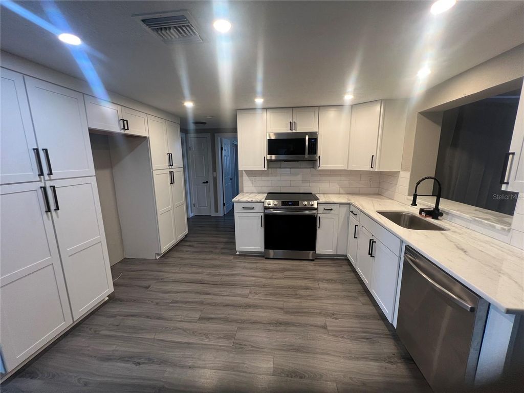 Photo of 6421 Stone Road, Port Richey, FL 34668 (MLS # TB8463477)