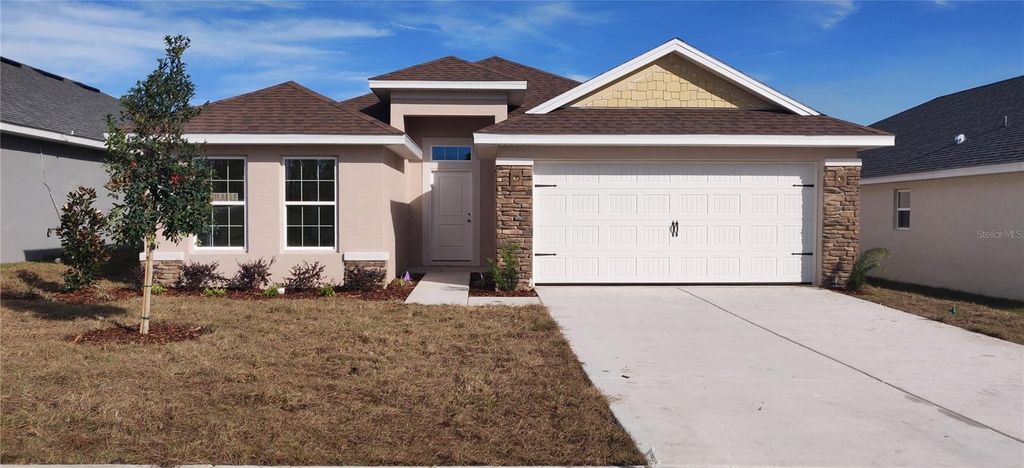 Photo of 5554 Ocean Breeze Drive, Spring Hill, FL 34609 (MLS # OM715521)
