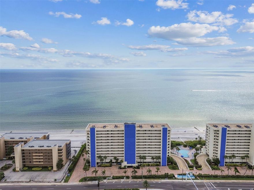 Coastal dreaming? Then this affordable direct Gulf front condominium is waiting for you.  Ocean Sands is a premier development in beautiful Madeira Beach. Imagine yourself on your private balcony soaking up gorgeous Sunsets, after spending a relaxing day lounging on the beach or the resort-style pool deck. Whether you are looking for a fabulous vacation getaway or a second home with income potential, Ocean Sands has the flexibility you desire with two-week vacation rentals allowed. As you open the front door, you are captivated by the picturesque Gulf view and gorgeous sunlight filling your spacious living area. At 940 square feet, this one-bedroom condominium offers an open floor plan with plenty of space to stretch out. The bedroom can accommodate two queen-size beds, has a substantial walk-in closet, and a sizable en-suite bath with separate shower and vanity area. Buyers will appreciate having a separate half bath for guests, a full-size walk-in laundry room just off the entry, and a nicely appointed eat-in kitchen with stone countertops and breakfast bar. For your outside pleasure, the large balcony with stunning views of the Gulf and its pristine white sand beaches will make entertaining easy with plenty of space to accommodate family and friends. The new owners will enjoy a beautiful newly updated community pool and spa, additional storage closet across from the unit, and an assigned under-building parking space. This condominium is being sold fully furnished for buyer's convenience. Beautiful Madeira Beach is convenient to Tampa International Airport, St. Pete Pier, many area attractions including John's Pass boardwalk, restaurants and shops, and supermarkets. Accessibility is easy with sidewalks and this great location. The building has successfully completed its Milestone inspection and made many fantastic recent upgrades and improvements to common areas and elevators. This condominium sustained no hurricane damage and is high and dry, according to the owner.  Call for your showing today as this spacious, affordable direct Gulf front condominium will not last long.