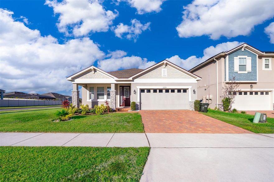 This new beautiful corner home is located in Waterbrooke community in Clermont, FL, offering amenities such as a clubhouse, outdoor space, pool, splash pad, playground, fitness center, and walking trails with pet stations. The home has an open layout with a fully equipped kitchen, 3 bedrooms, 2 bathrooms, and a split floor plan. Features include a large patio with privacy, hard floors in common areas, carpeted bedrooms, a spacious master suite with a walk-in closet and private bath. It's centrally located near shopping, schools, and major roads, with easy access to Downtown Orlando and attractions.